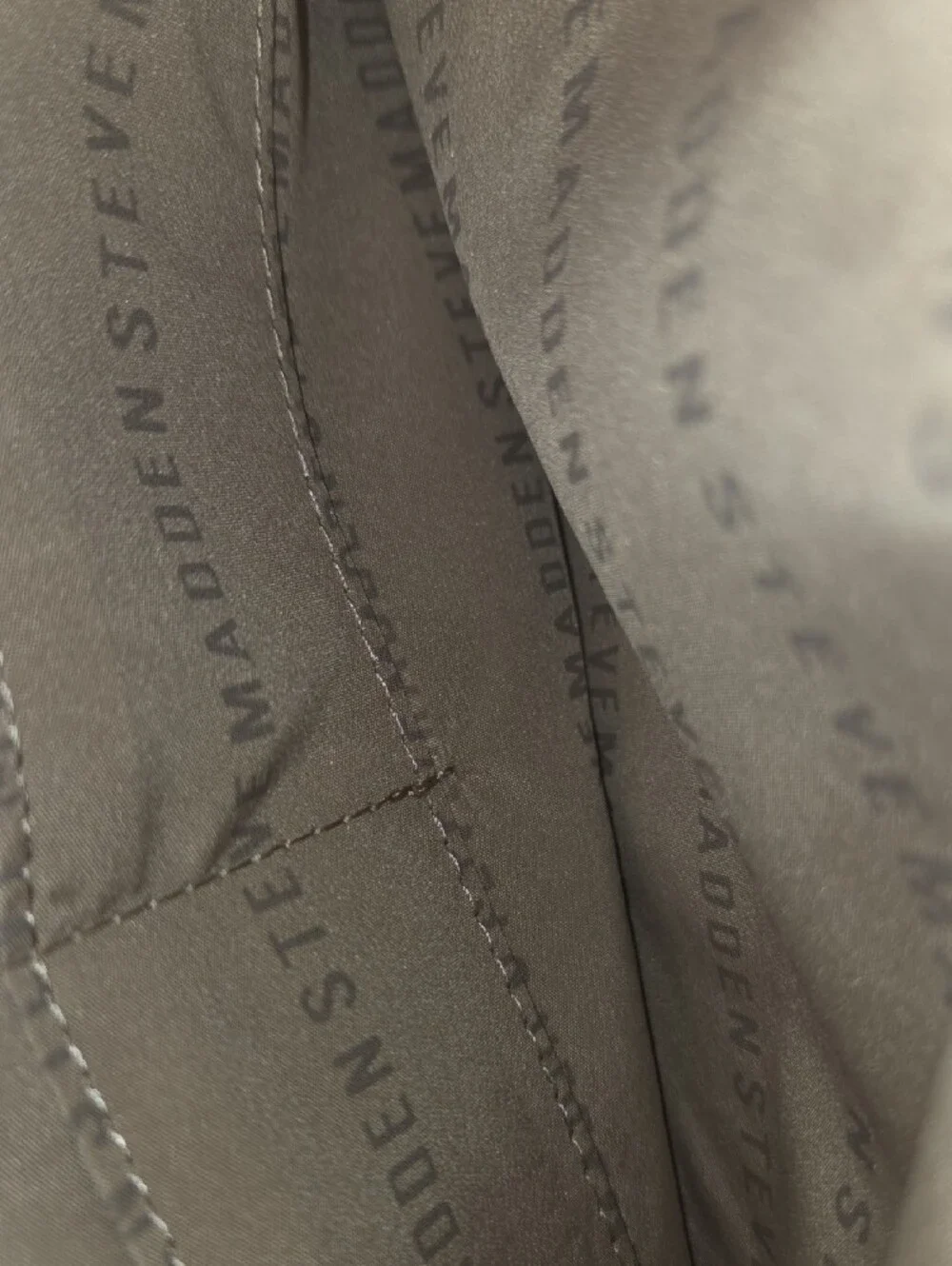 Steve Madden Taupe Embossed Logo Wristlet Clutch